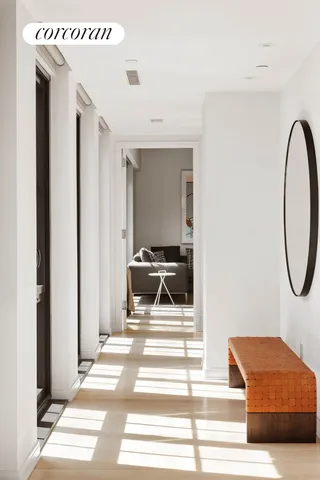 a terrace with outdoor seating and city view