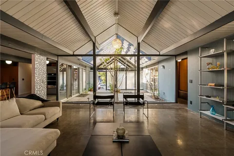 a view of a livingroom with furniture