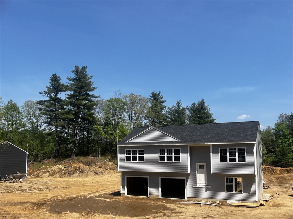 940 Old West Brookfield Road Warren, MA 01083 - Photo 4 of 4 a view of a white house with a yard