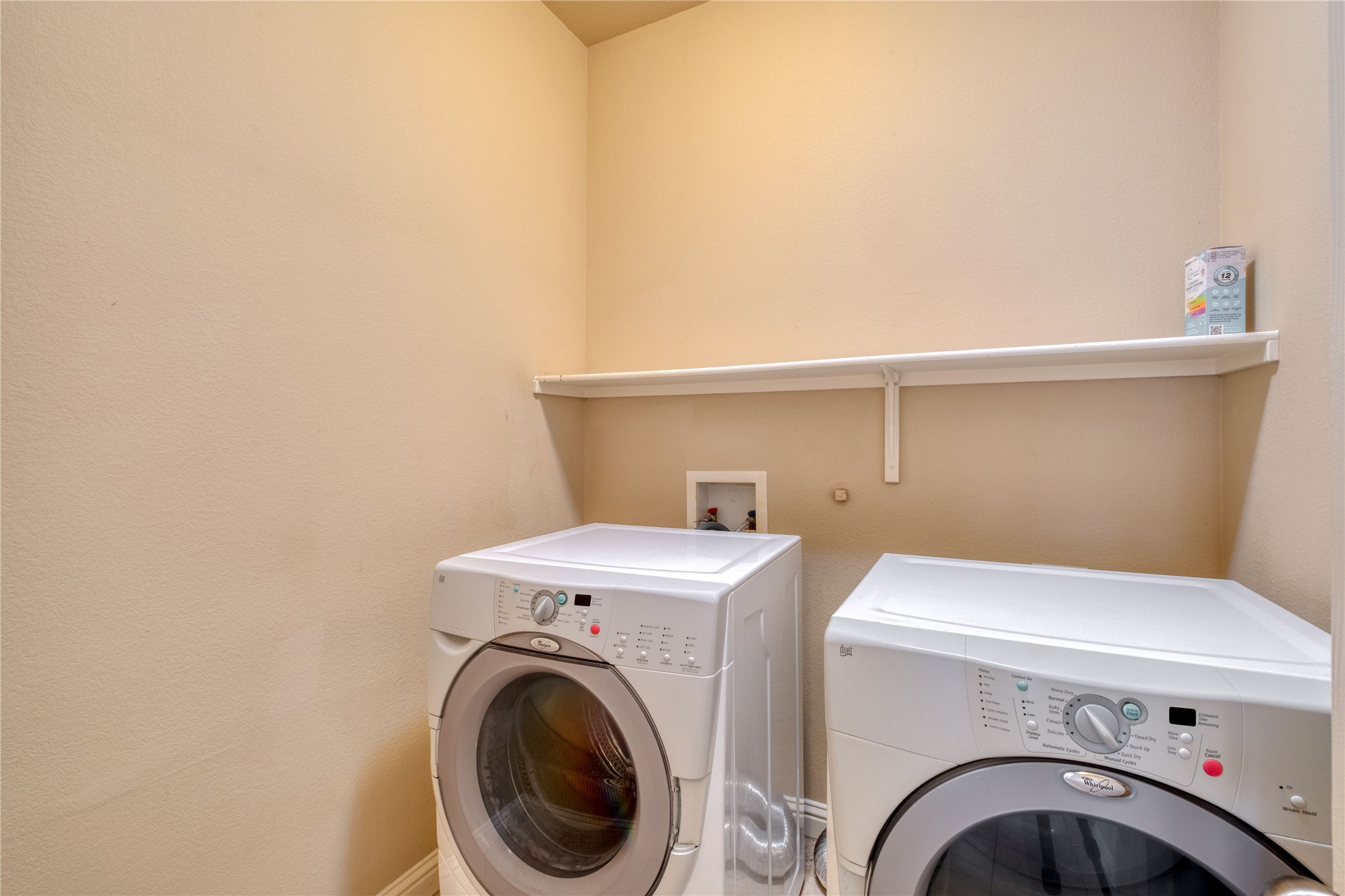194 Cold Springs Spring Buda, TX 78610 - Photo 15 of 17 Laundry area with independent washer and dryer