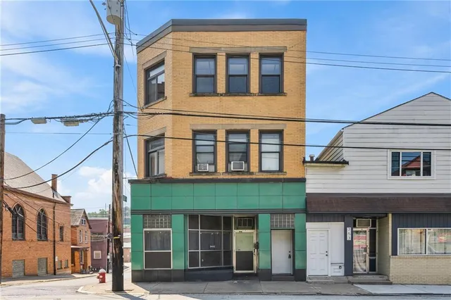 a bathroom with a sink a bathtub and a window