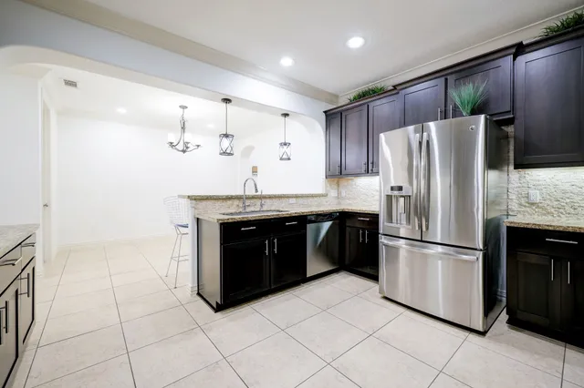 a kitchen with a stove and a microwave