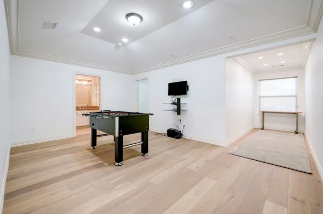 a room with furniture and a wooden floor