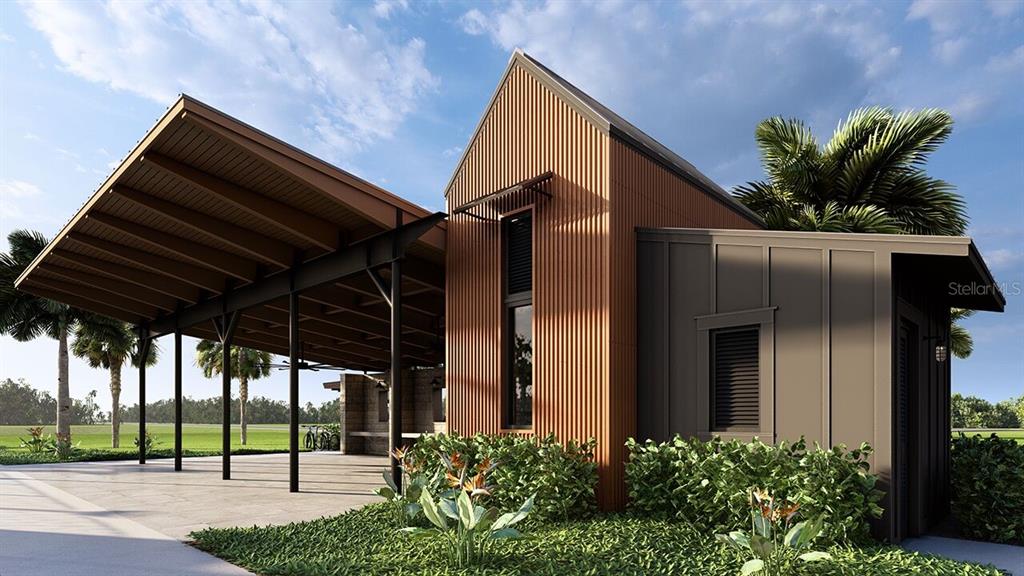 9026 Optimist Way Palmetto, FL 34221 - Photo 18 of 21 a house view with a garden space