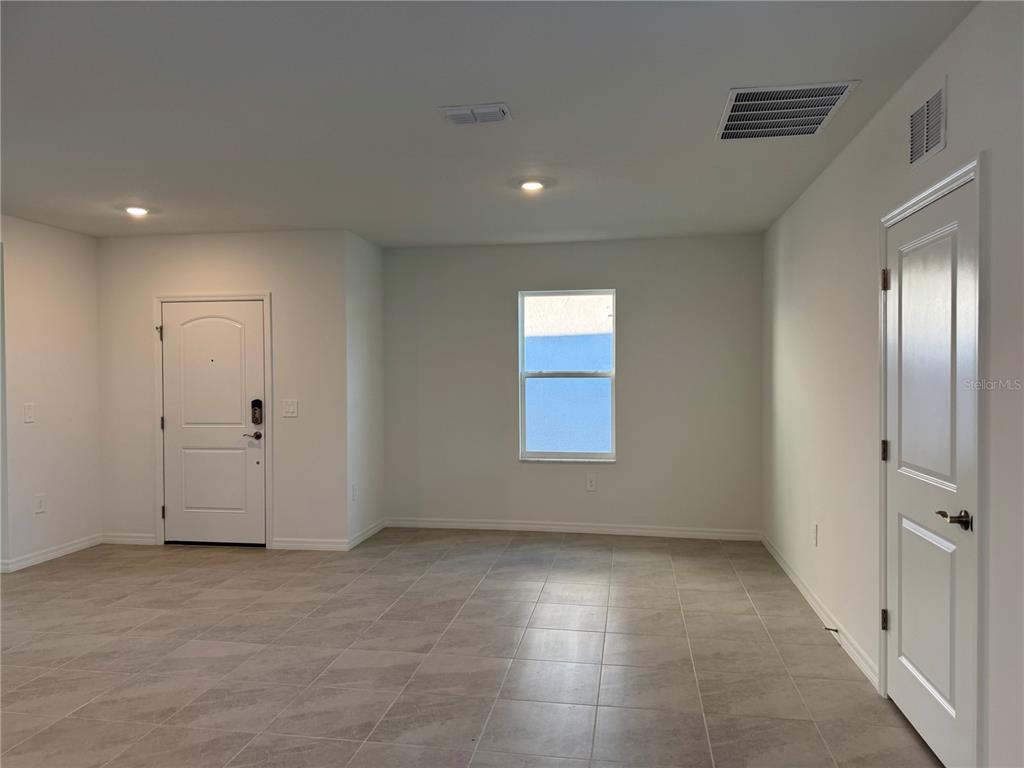9026 Optimist Way Palmetto, FL 34221 - Photo 8 of 21 a view of an empty room