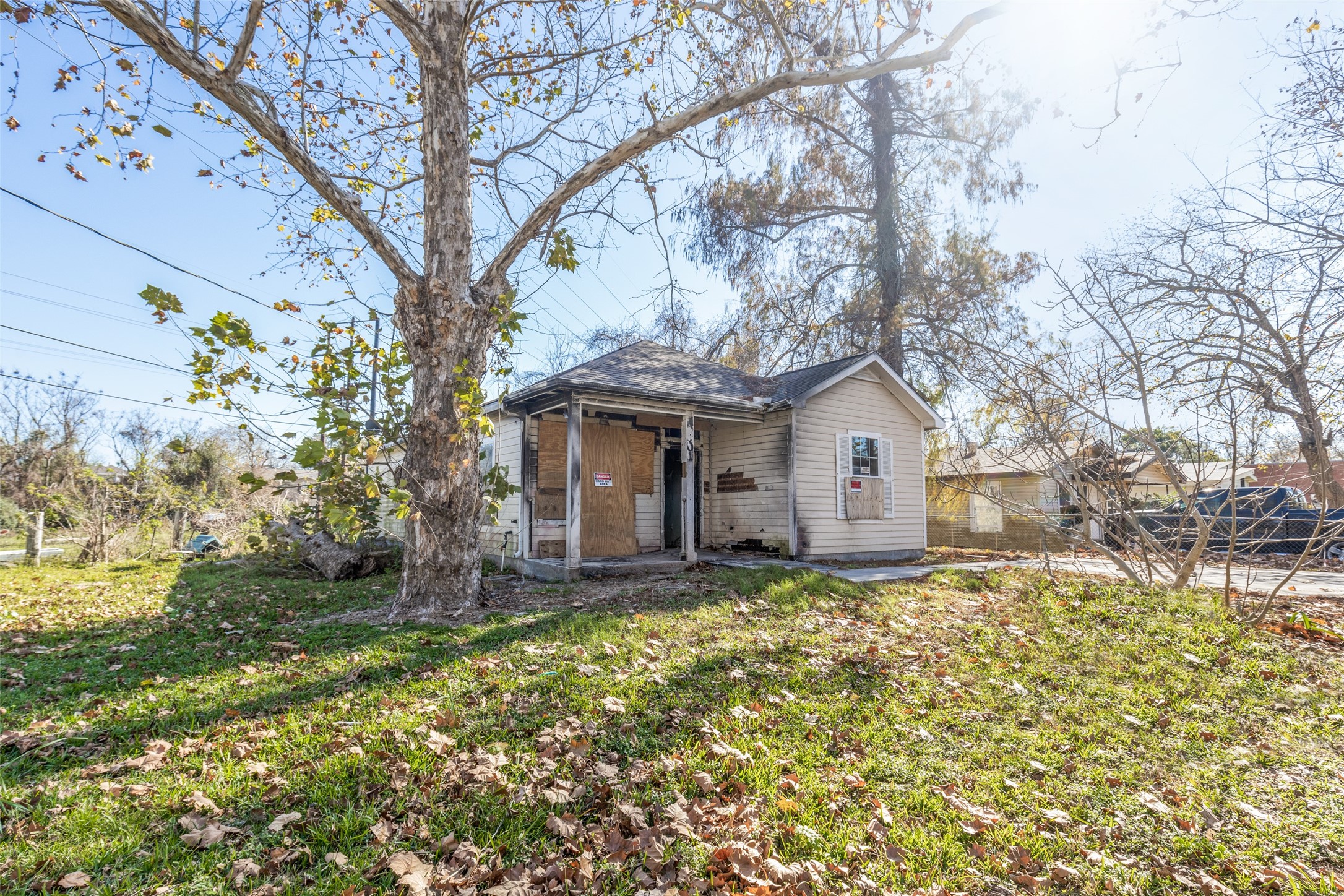 301 Albert Street La Marque, TX 77568 - Photo 1 of 22 a view of a house with a large tree and a big yard