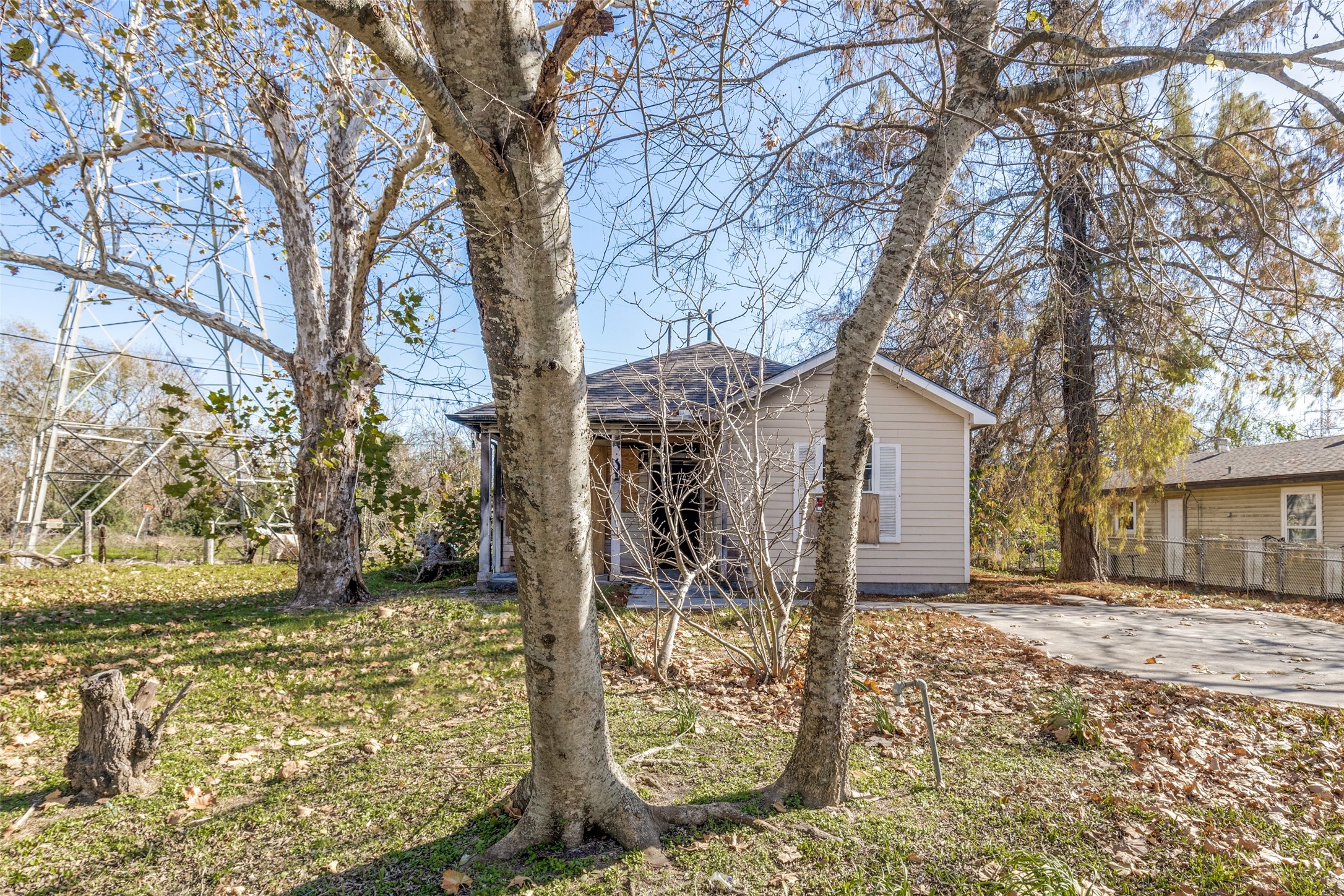 301 Albert Street La Marque, TX 77568 - Photo 2 of 22 a tree in front of a white house