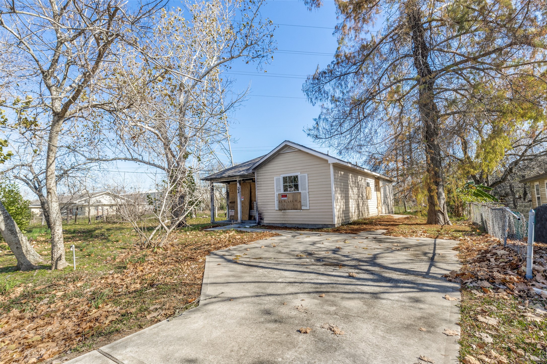 301 Albert Street La Marque, TX 77568 - Photo 5 of 22 a front view of a house with a yard covered in snow