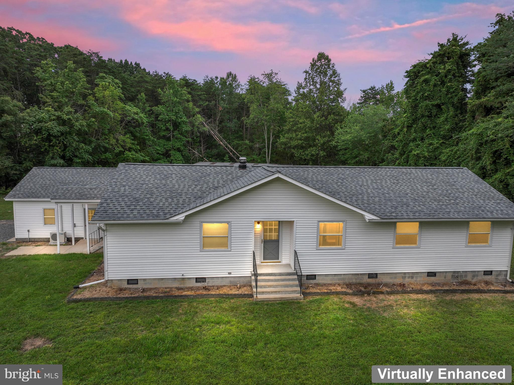 4 River Ridge Lane Fredericksburg, VA 22406 - Photo 2 of 43 a front view of a house with a yard