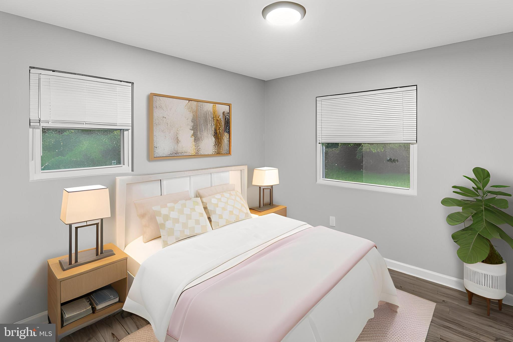 4 River Ridge Lane Fredericksburg, VA 22406 - Photo 23 of 43 a bedroom with a bed and a potted plant