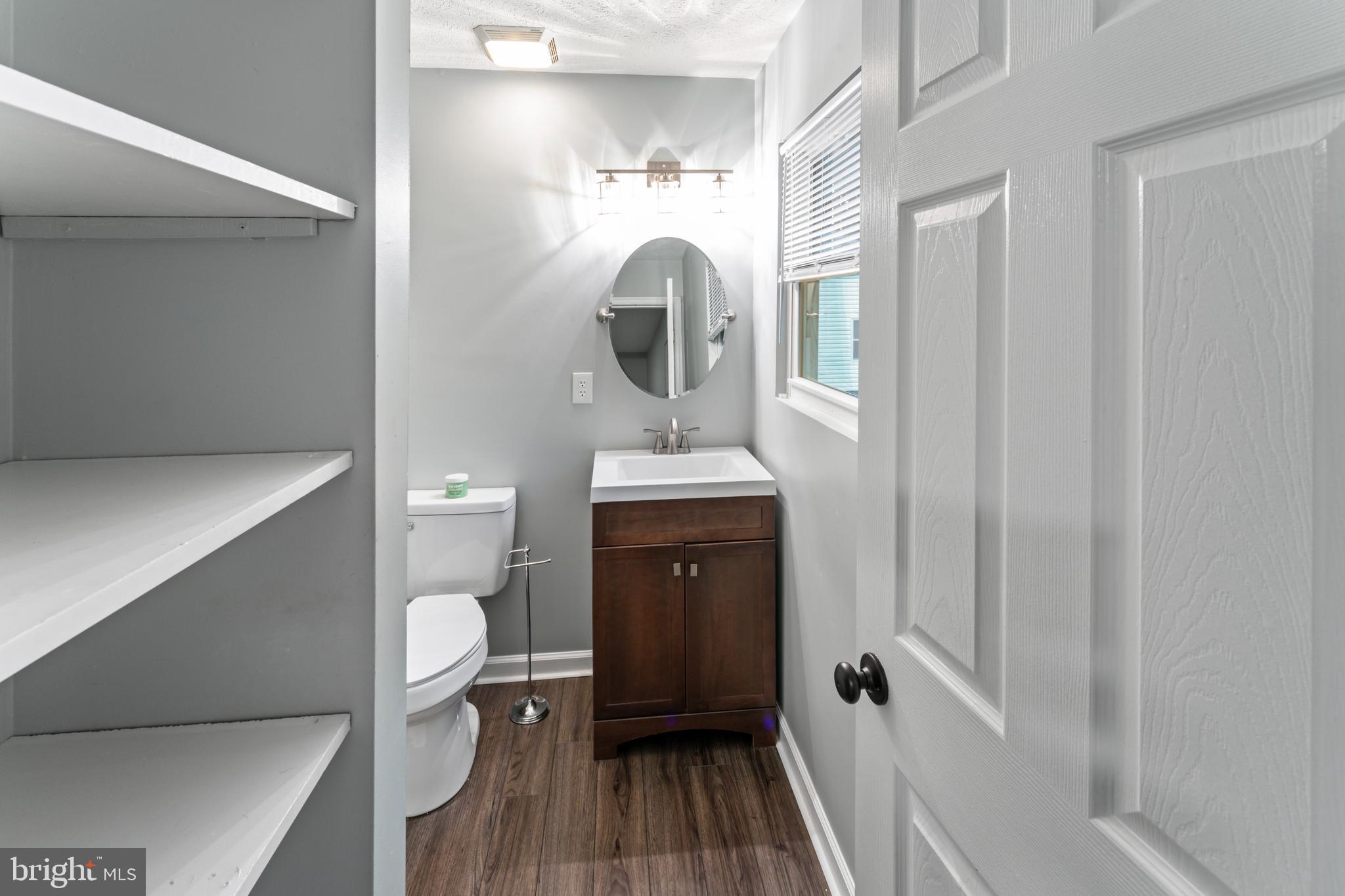 4 River Ridge Lane Fredericksburg, VA 22406 - Photo 29 of 43 a bathroom with a sink a toilet and shower