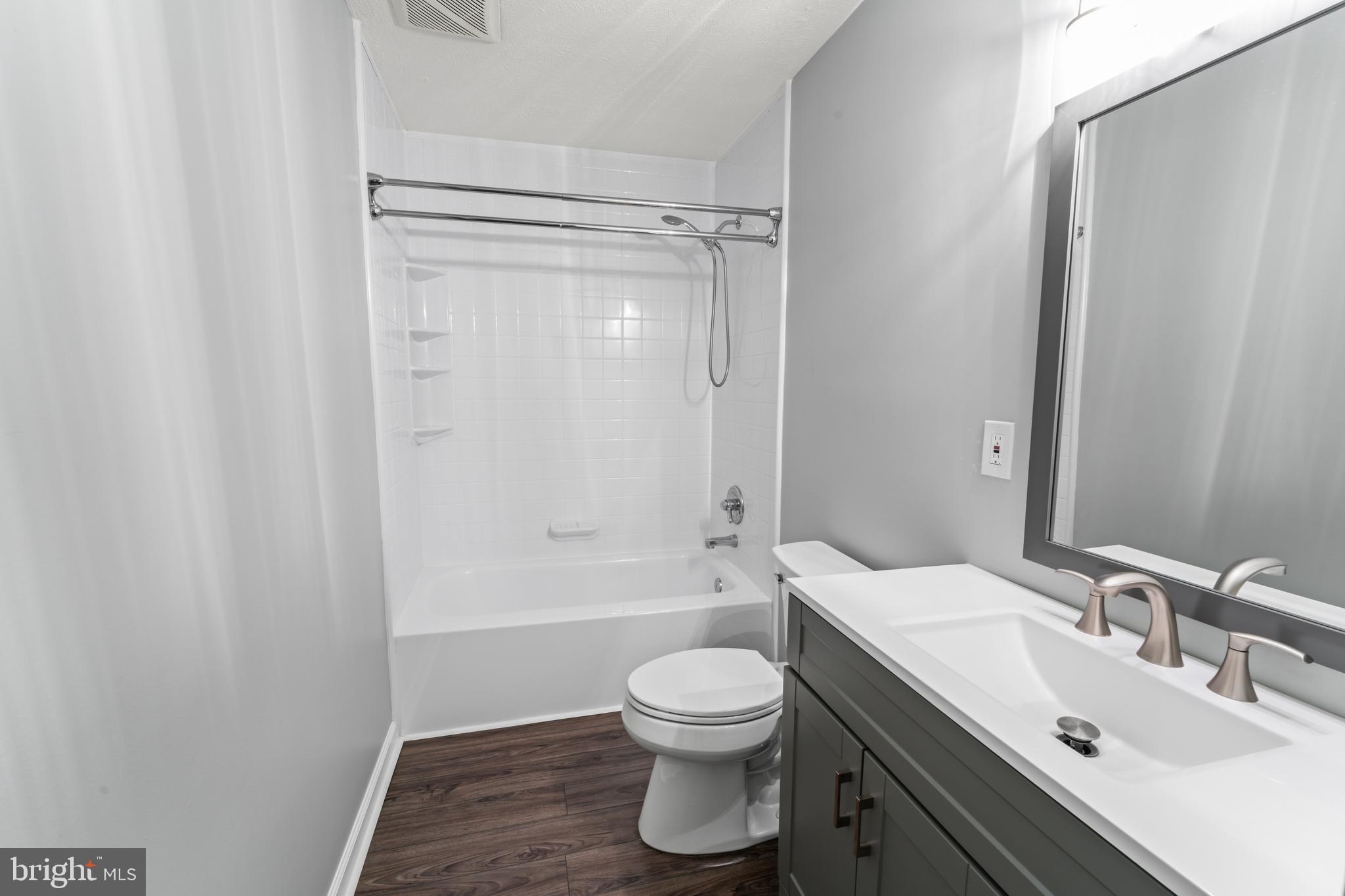 4 River Ridge Lane Fredericksburg, VA 22406 - Photo 30 of 43 a bathroom with a sink toilet and shower