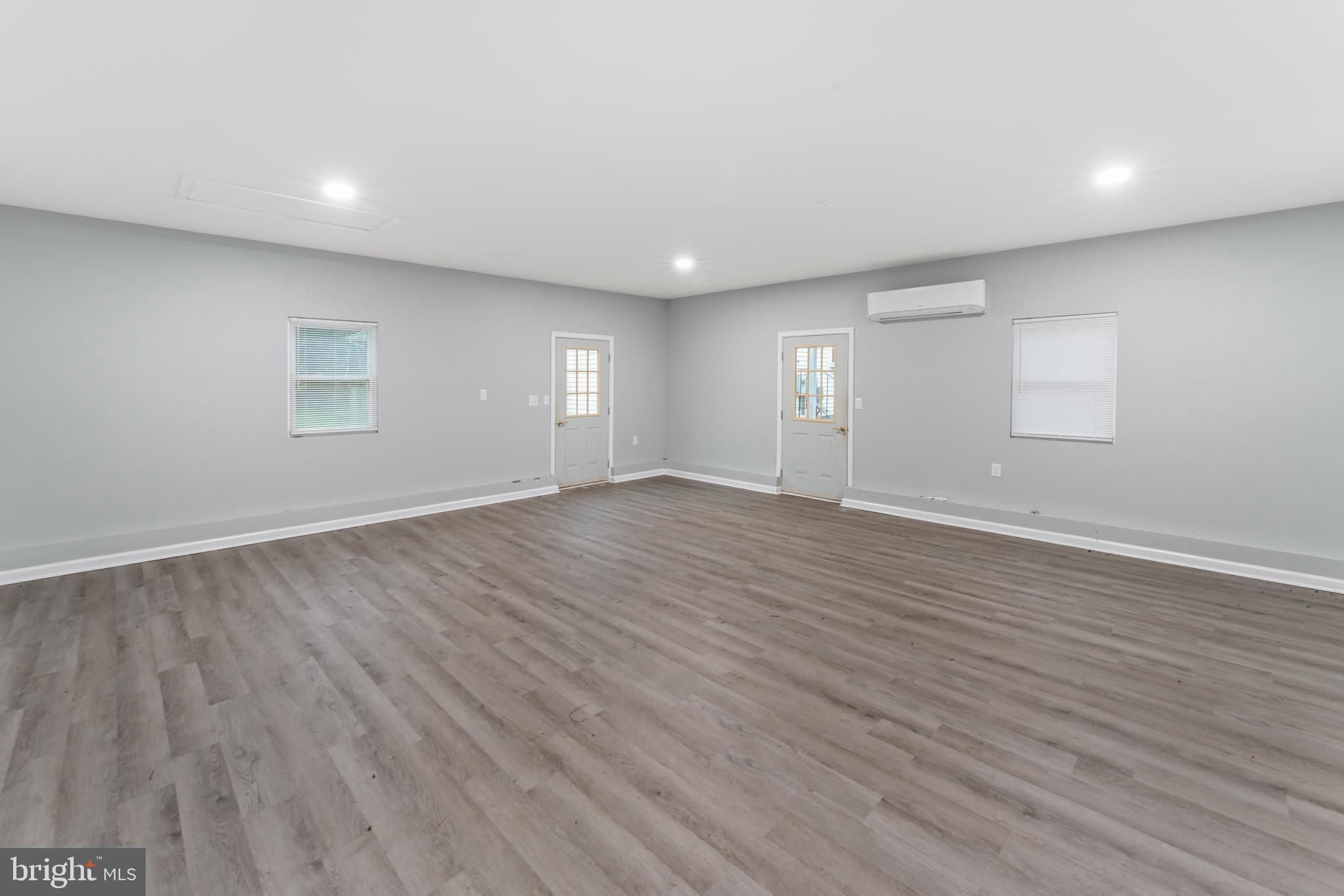 4 River Ridge Lane Fredericksburg, VA 22406 - Photo 36 of 43 a view of an empty room with wooden floor and a window