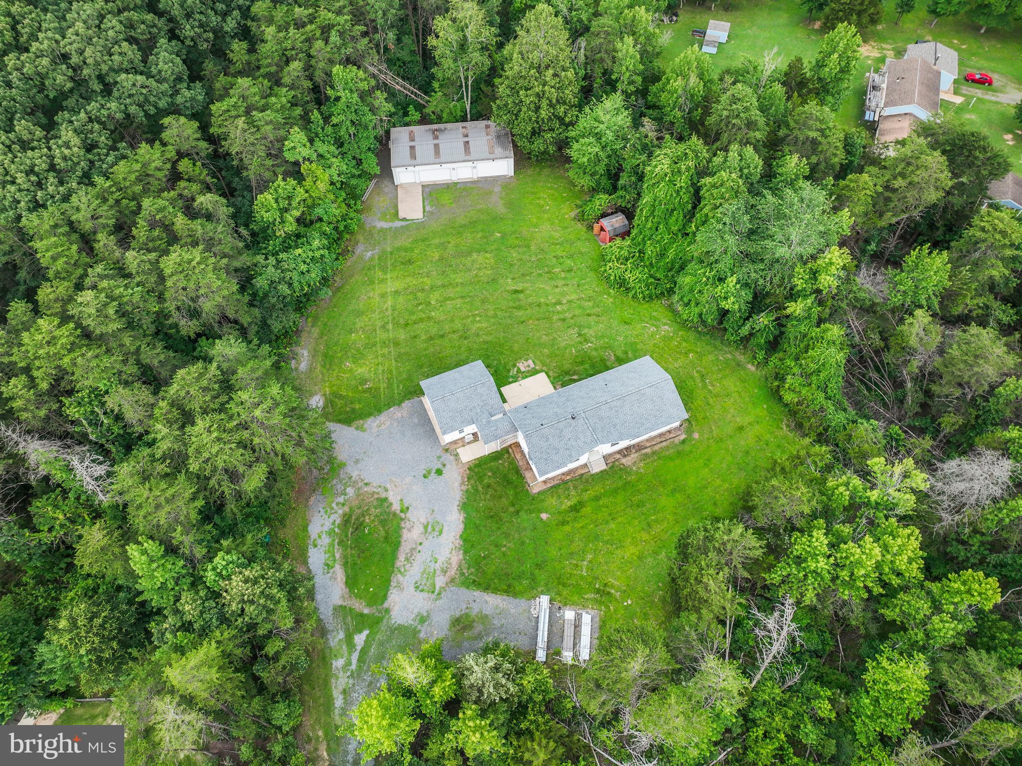 4 River Ridge Lane Fredericksburg, VA 22406 - Photo 39 of 43 an aerial view of a house with a yard