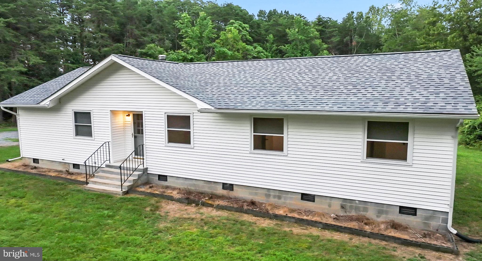 4 River Ridge Lane Fredericksburg, VA 22406 - Photo 42 of 43 a aerial view of a house with a yard and large tree