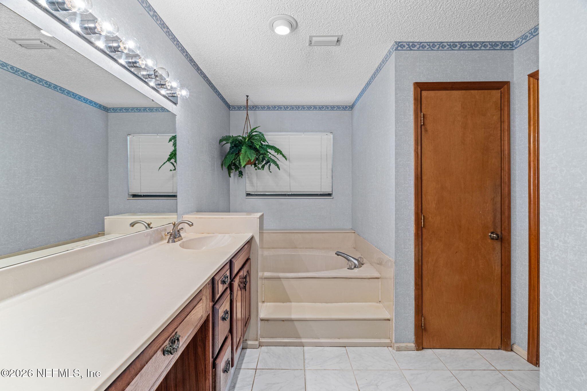 4841 Raggedy Point Road Fleming Island, FL 32003 - Photo 38 of 62 Primary Suite Bathroom View 2