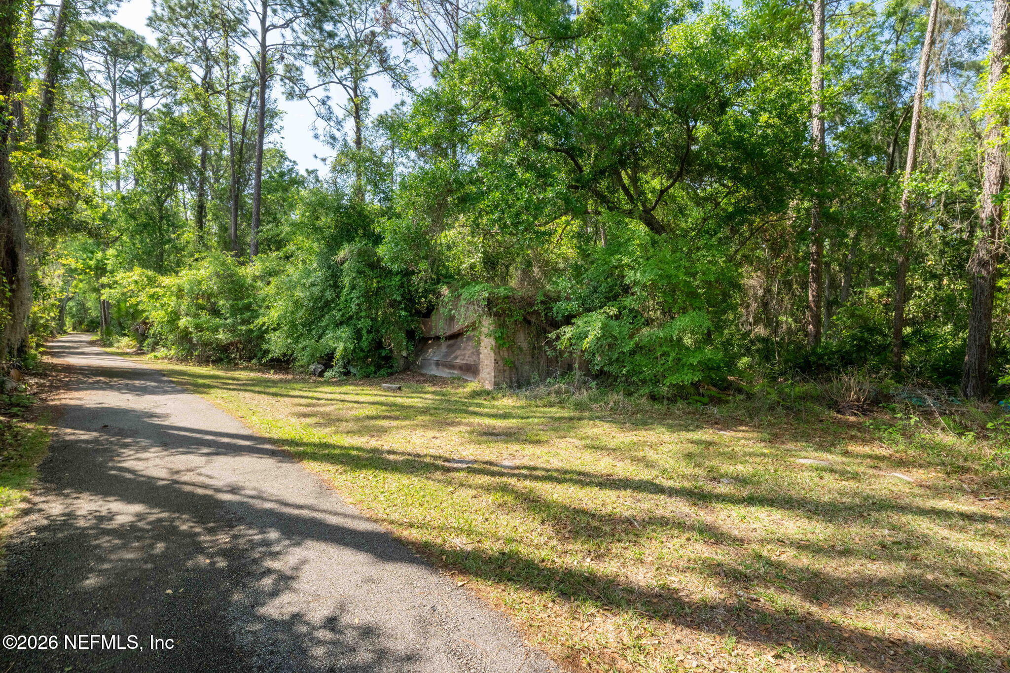 4841 Raggedy Point Road Fleming Island, FL 32003 - Photo 7 of 62 Drive showing old garage
