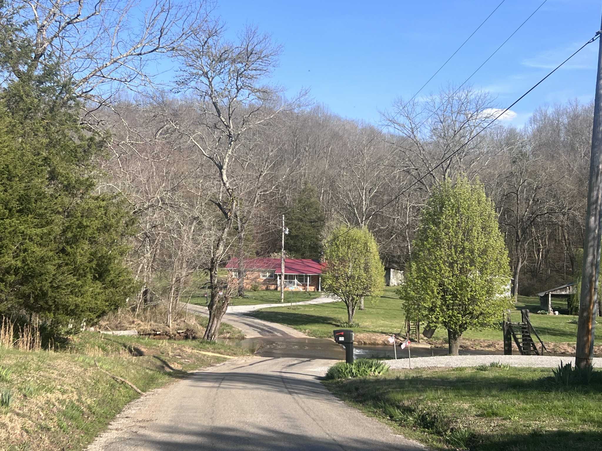 285 Spring Creek Road Lawrenceburg, TN 38464 - Photo 1 of 45 a childrens park with lots of trees