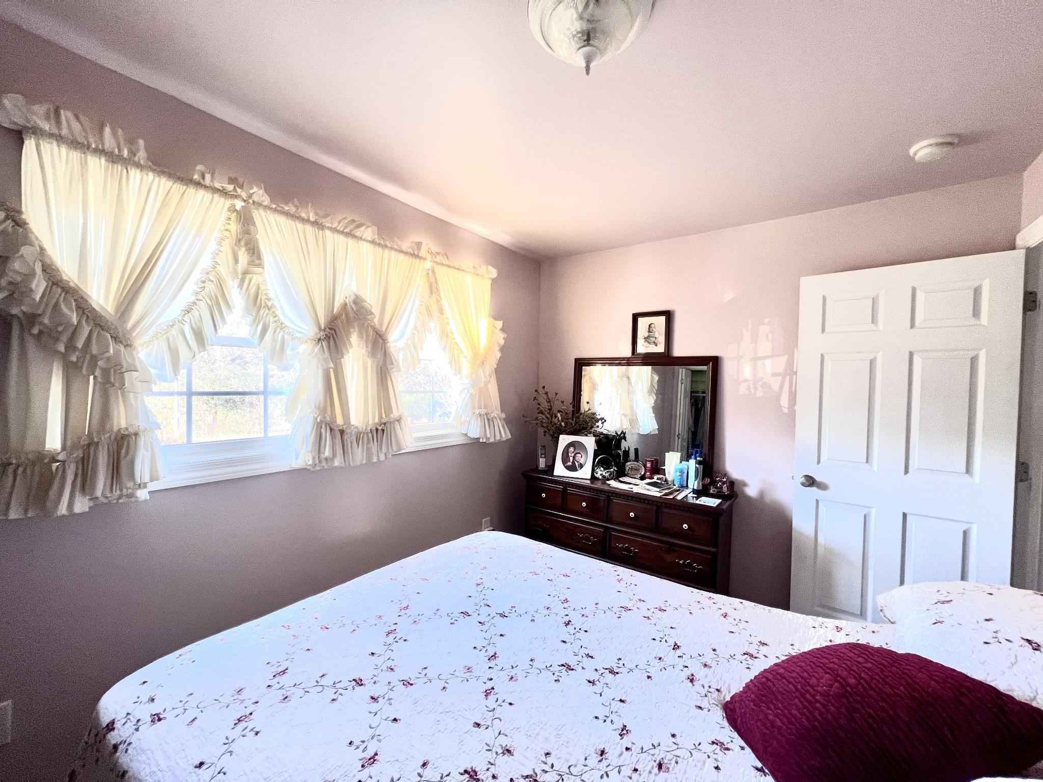 285 Spring Creek Road Lawrenceburg, TN 38464 - Photo 35 of 45 a bedroom with a bed and a flat screen tv
