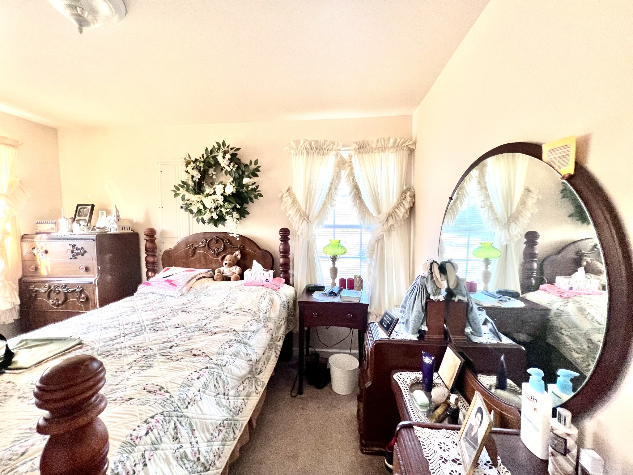 285 Spring Creek Road Lawrenceburg, TN 38464 - Photo 36 of 45 a bed sitting in a bedroom next to a window