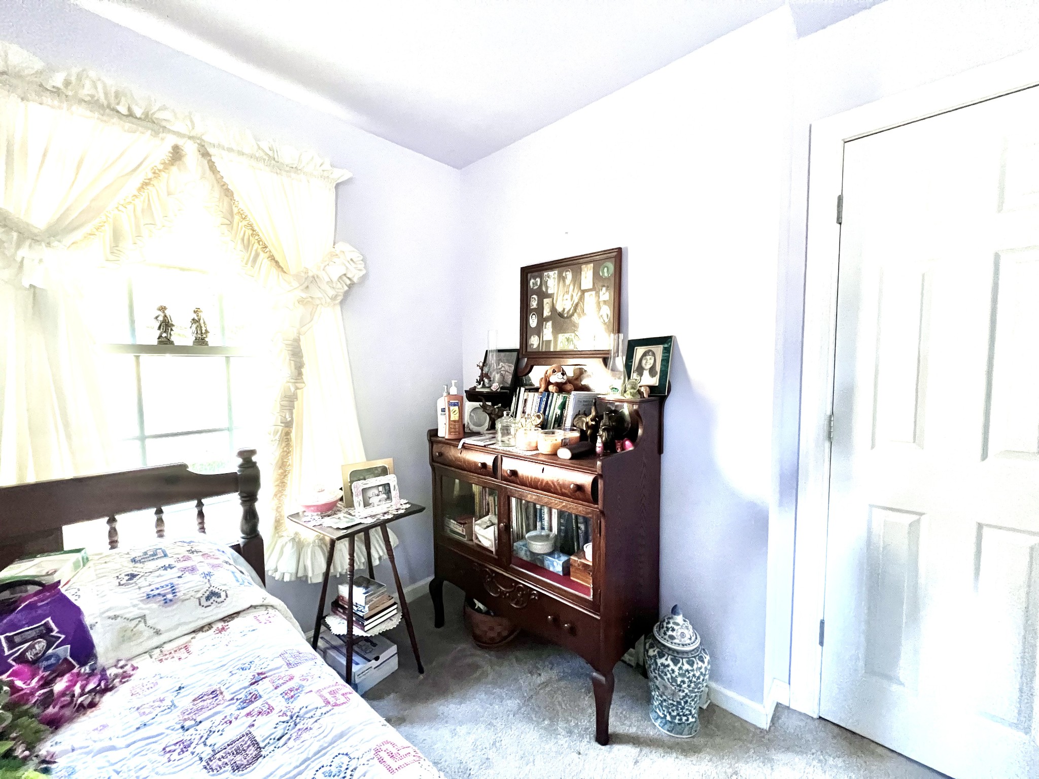 285 Spring Creek Road Lawrenceburg, TN 38464 - Photo 39 of 45 a bedroom with a bed and a window