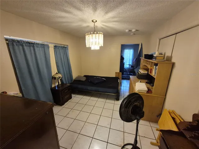 a bathroom with a sink a mirror and shower