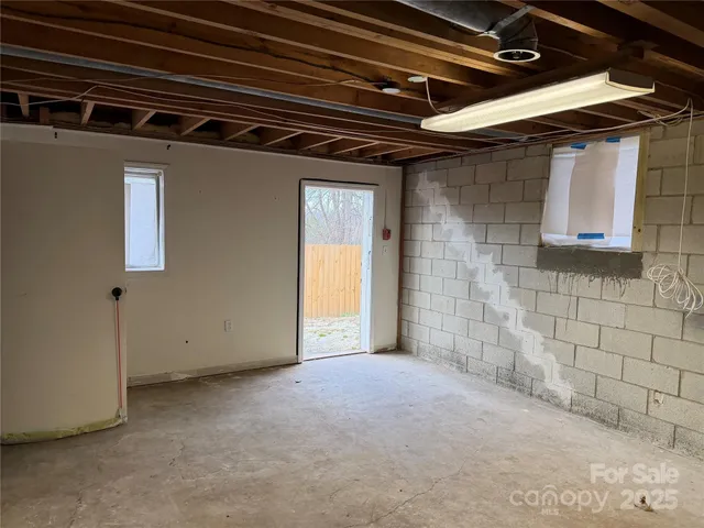 a bathroom with a sink mirror vanity and toilet