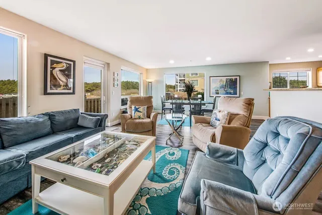 a living room with furniture and a table