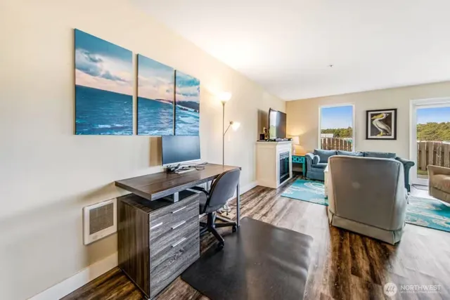 a workspace with furniture and window