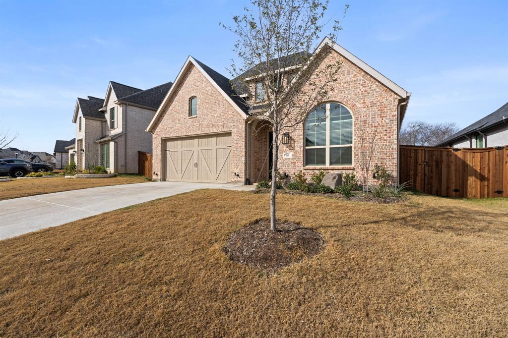 1606 Bulls Eye Road Mansfield, TX 76063 - Photo 2 of 27 a front view of a house with a yard