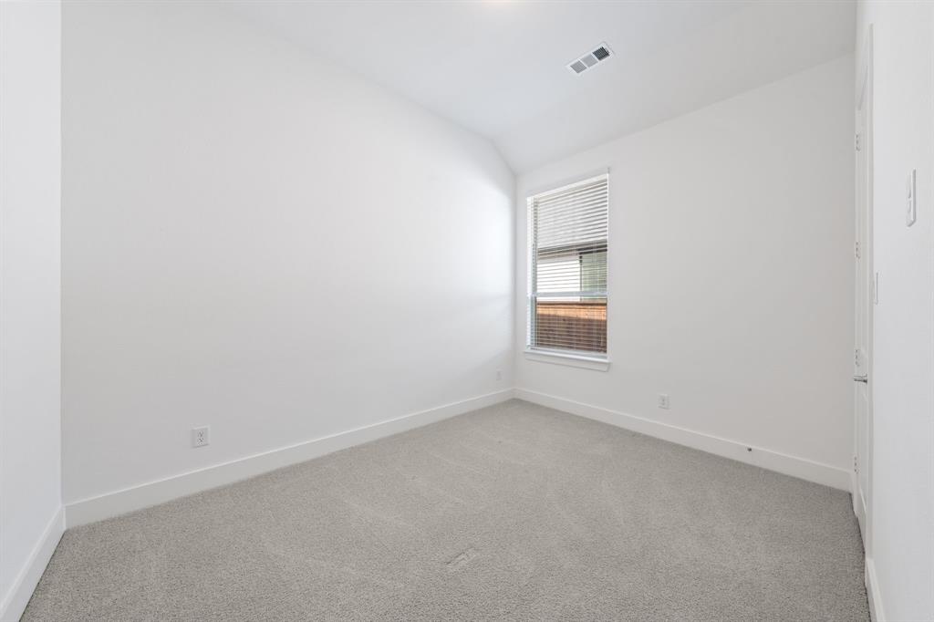 1606 Bulls Eye Road Mansfield, TX 76063 - Photo 21 of 27 a view of an empty room with a window