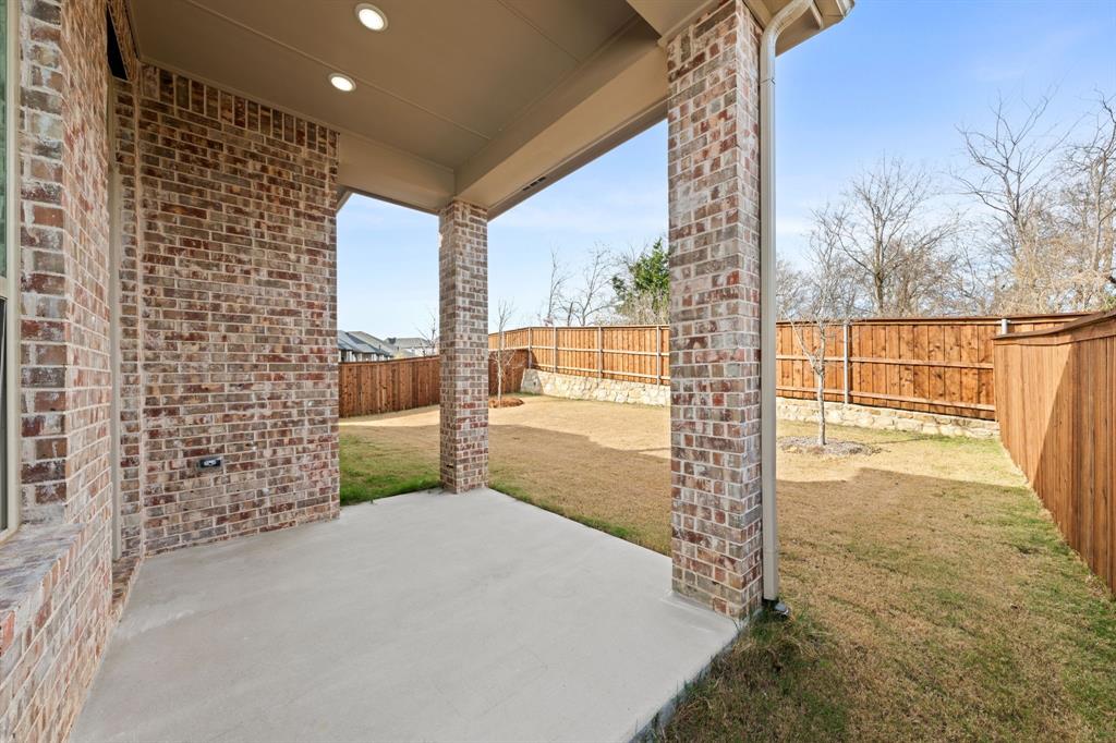 1606 Bulls Eye Road Mansfield, TX 76063 - Photo 24 of 27 a bedroom with a balcony a bed and a window