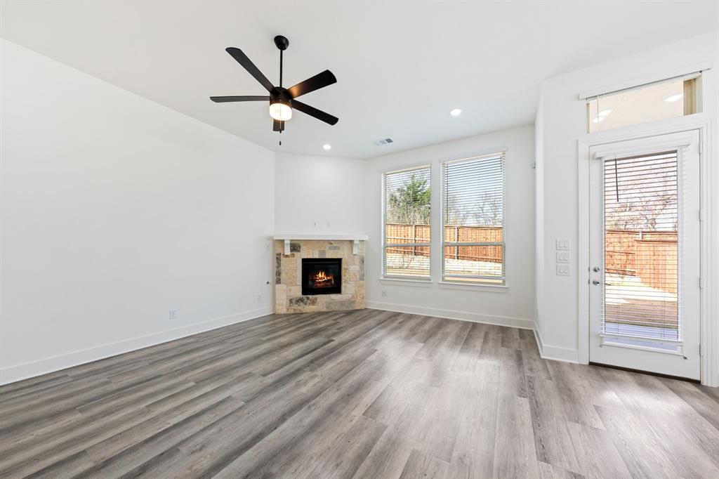 1606 Bulls Eye Road Mansfield, TX 76063 - Photo 6 of 27 a view of empty room with wooden floor and fan