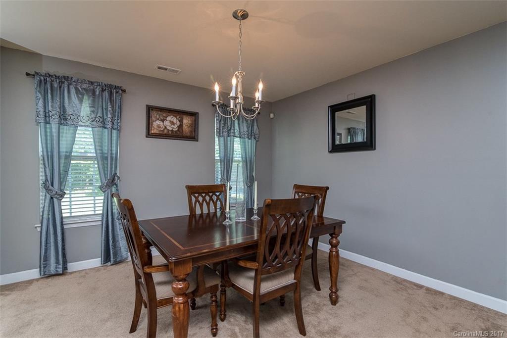 982 Ramsgate Drive Southwest Concord, NC 28025 - Photo 6 of 22 a view of a dining room with furniture and window