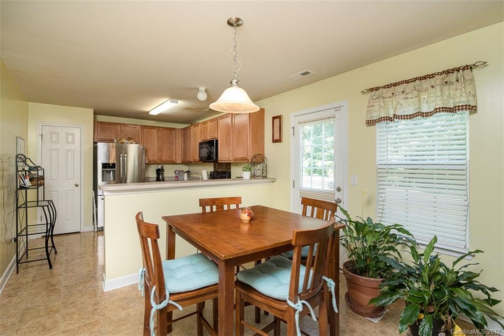982 Ramsgate Drive Southwest Concord, NC 28025 - Photo 7 of 22 a dining room with furniture and window
