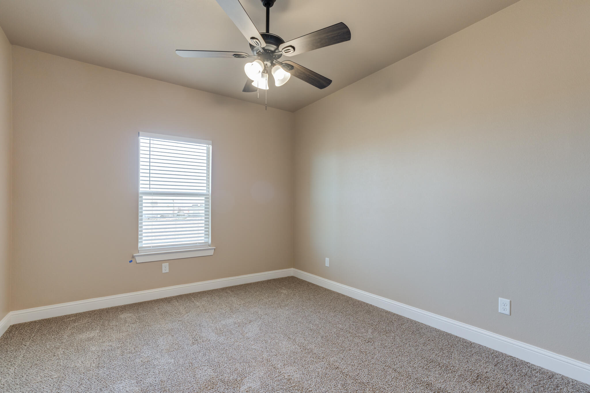 12401 North C R 2900 Lubbock, TX 79403 - Photo 30 of 40 an empty room with a window