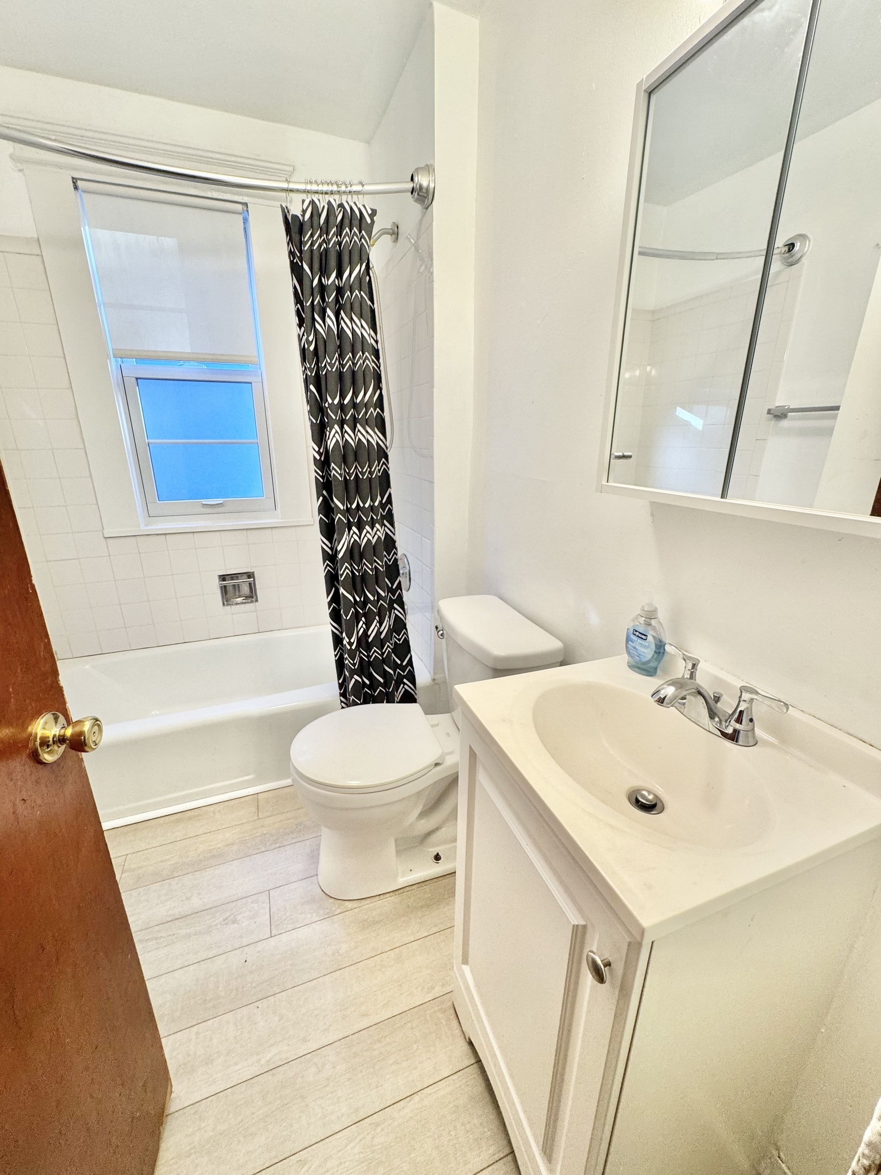 87 Butler Street New Haven, CT 06511 - Photo 4 of 10 a bathroom with a sink a toilet and shower