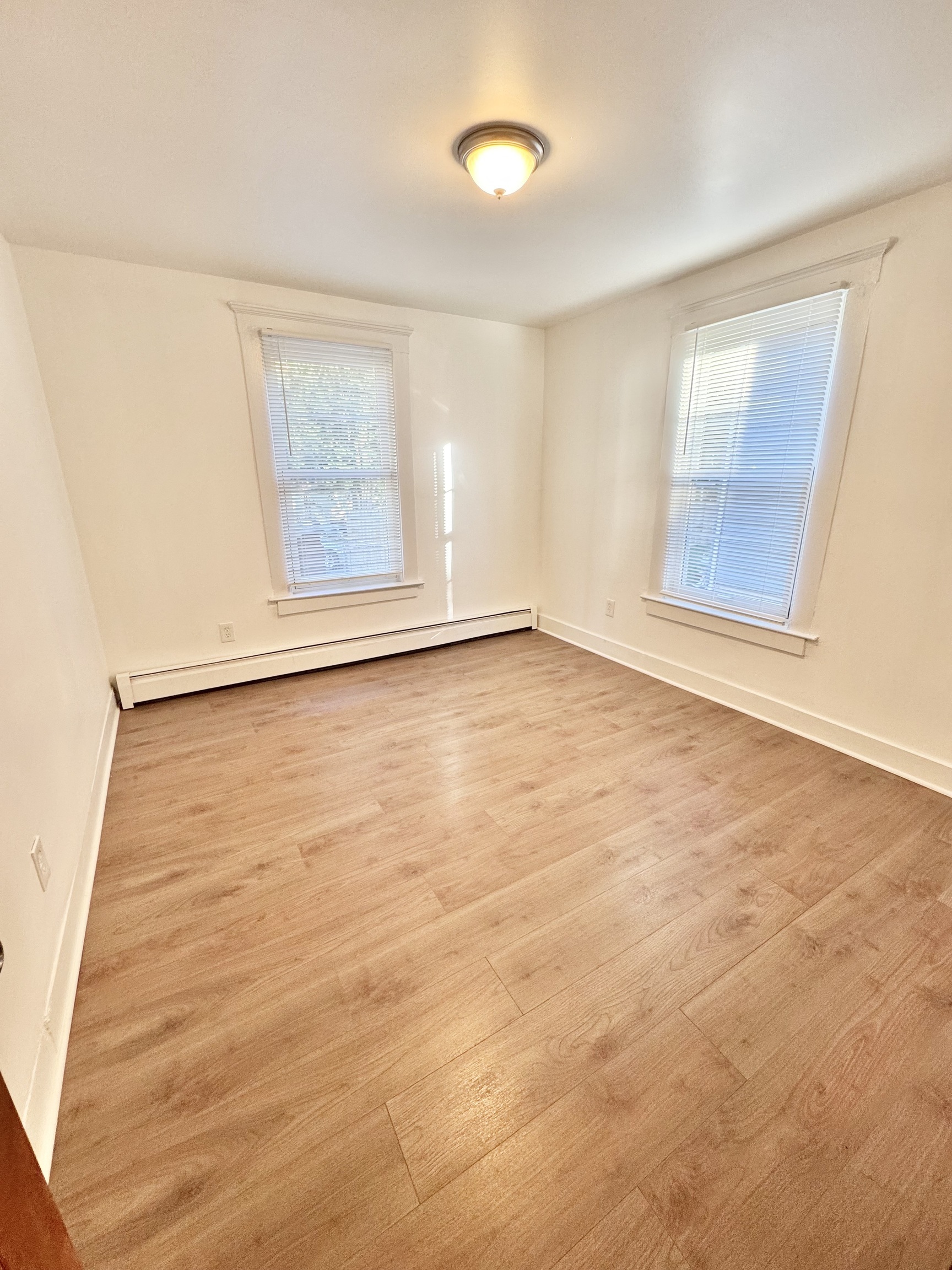 87 Butler Street New Haven, CT 06511 - Photo 7 of 10 an empty room with windows