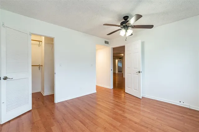 a view of building with river in front of it