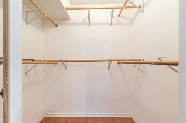 a view of a balcony with floor to ceiling window stairs