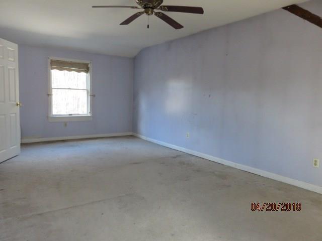 105 Huff Road Lyman, ME 04002 - Photo 13 of 15 There is a large master bedroom