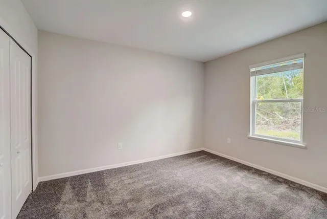 an empty room with a window