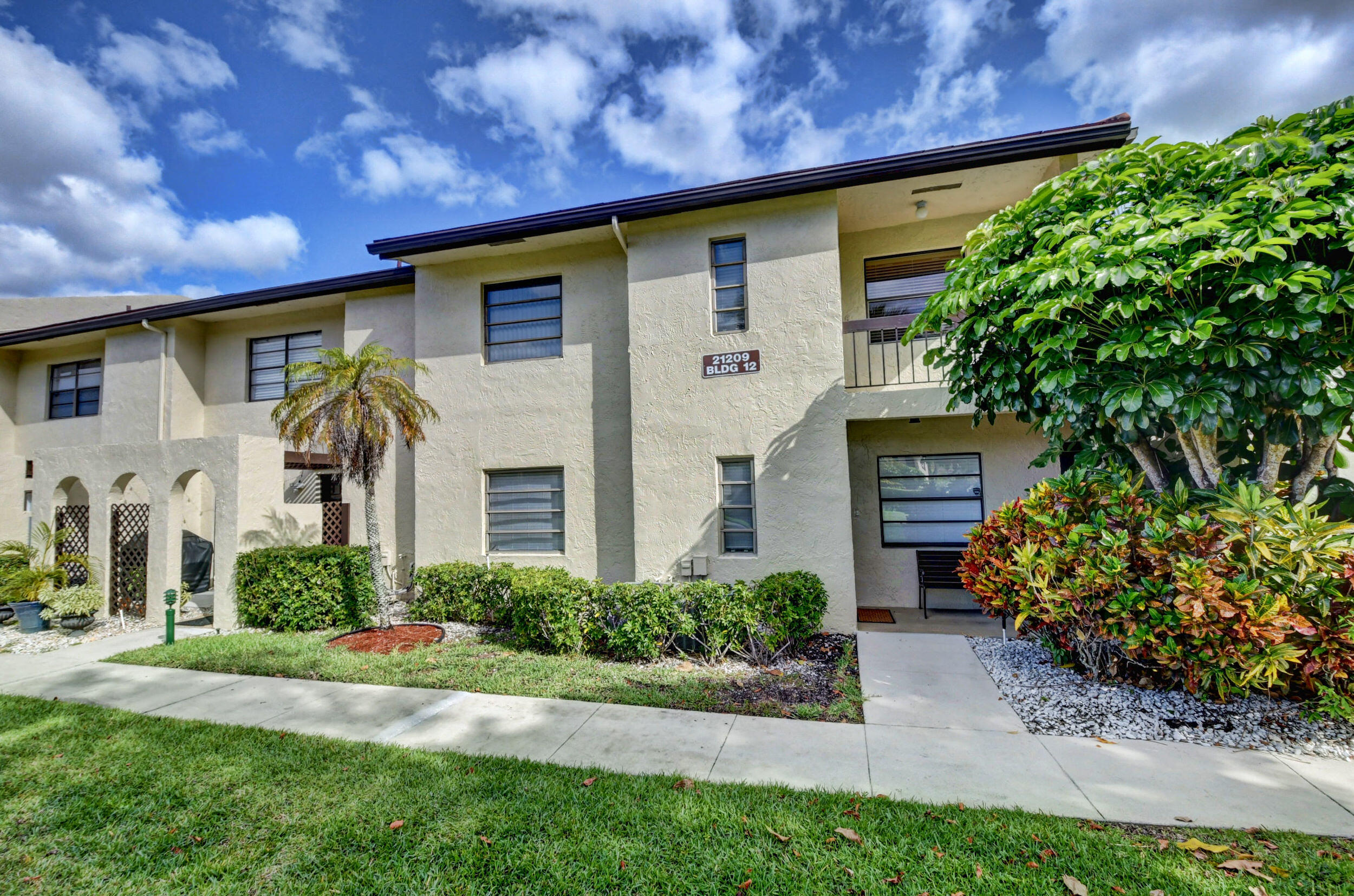 21209 Lago Circle, Unit 12F Boca Raton, FL 33433 - Photo 1 of 54 Front door entrance