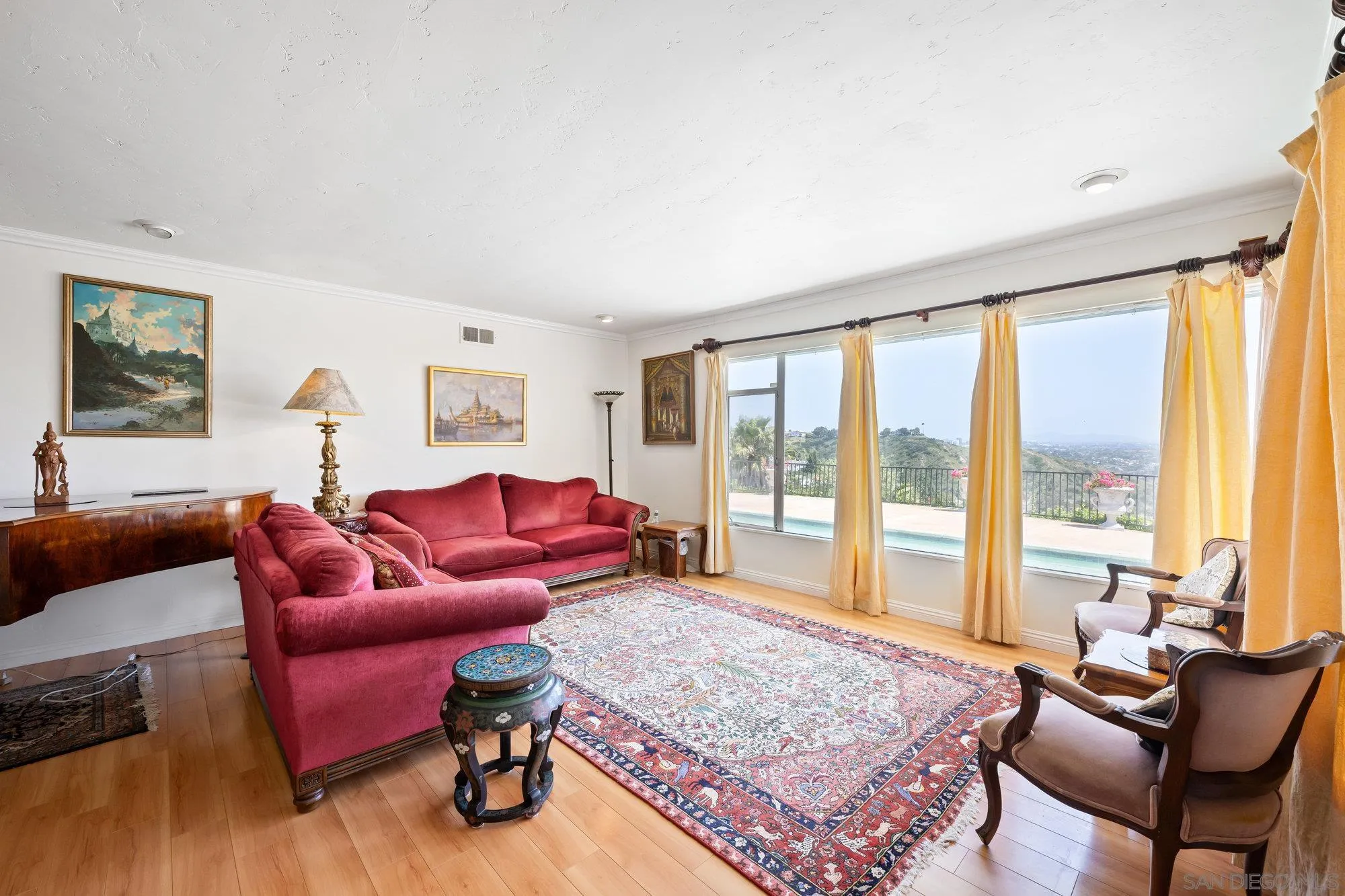 5903 Soledad Mountain Road La Jolla, CA 92037 - Photo 12 of 44 a living room with furniture and a rug