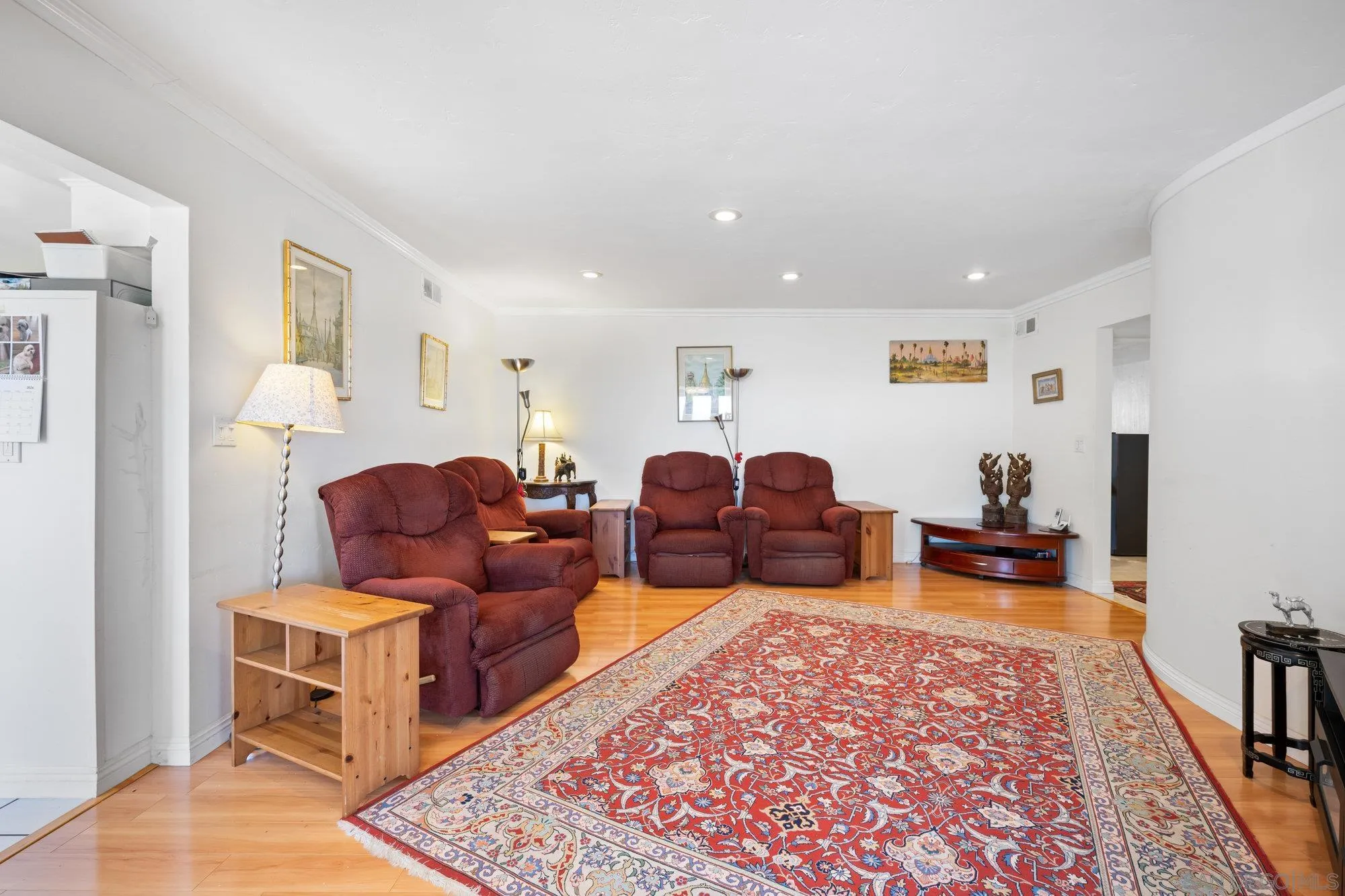 5903 Soledad Mountain Road La Jolla, CA 92037 - Photo 17 of 44 a living room with furniture and a rug