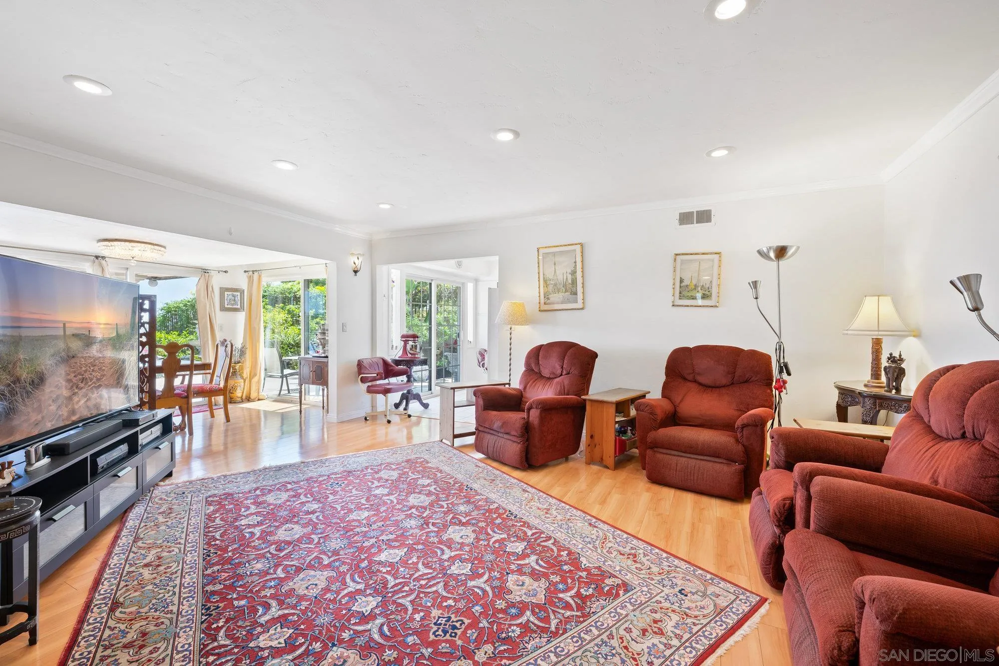 5903 Soledad Mountain Road La Jolla, CA 92037 - Photo 18 of 44 a living room with furniture and a flat screen tv