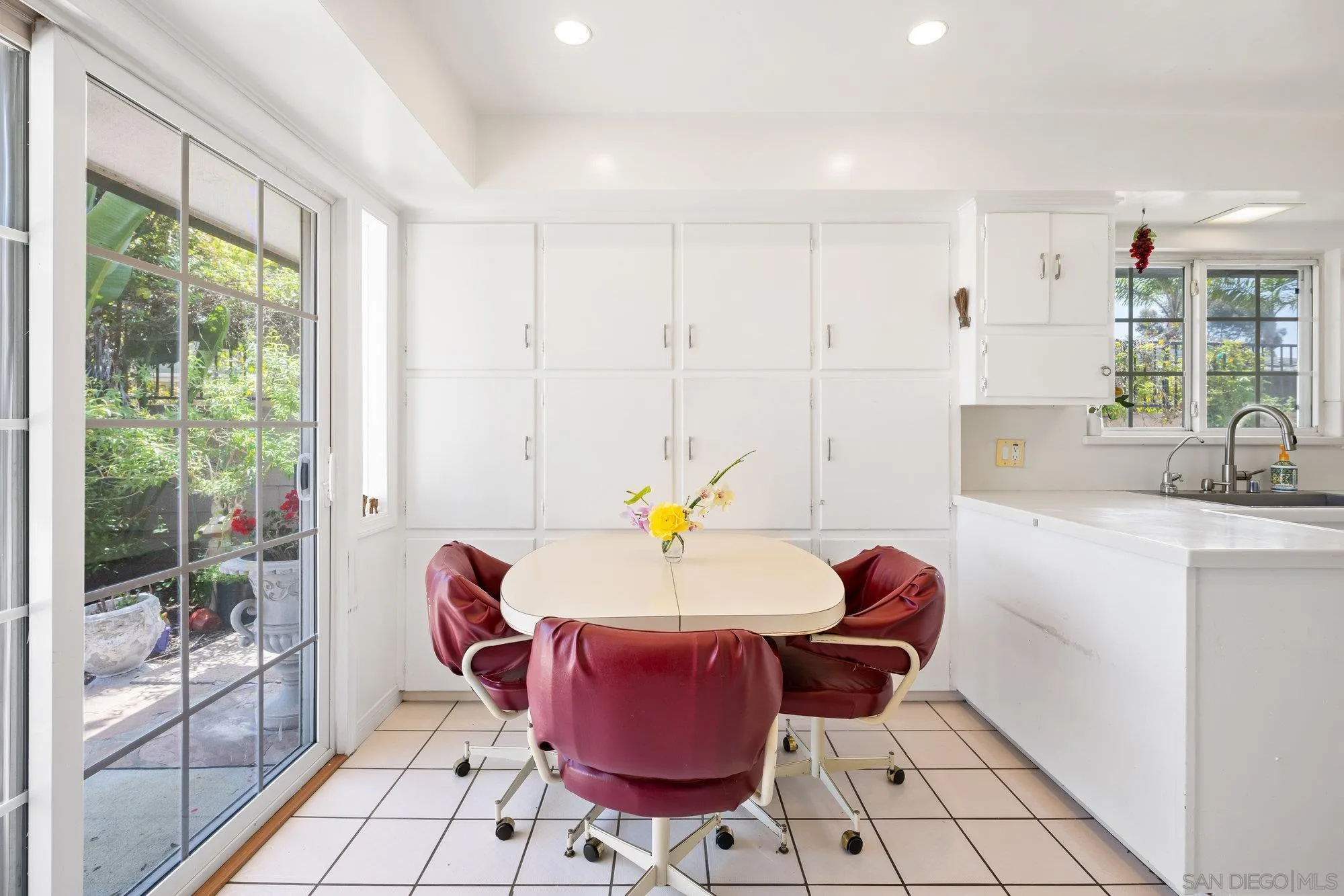 5903 Soledad Mountain Road La Jolla, CA 92037 - Photo 19 of 44 a living room with furniture and a floor to ceiling window