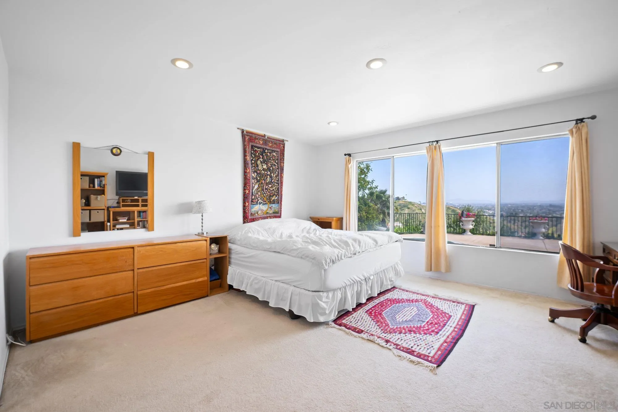 5903 Soledad Mountain Road La Jolla, CA 92037 - Photo 23 of 44 a bed room with a bed and a couch