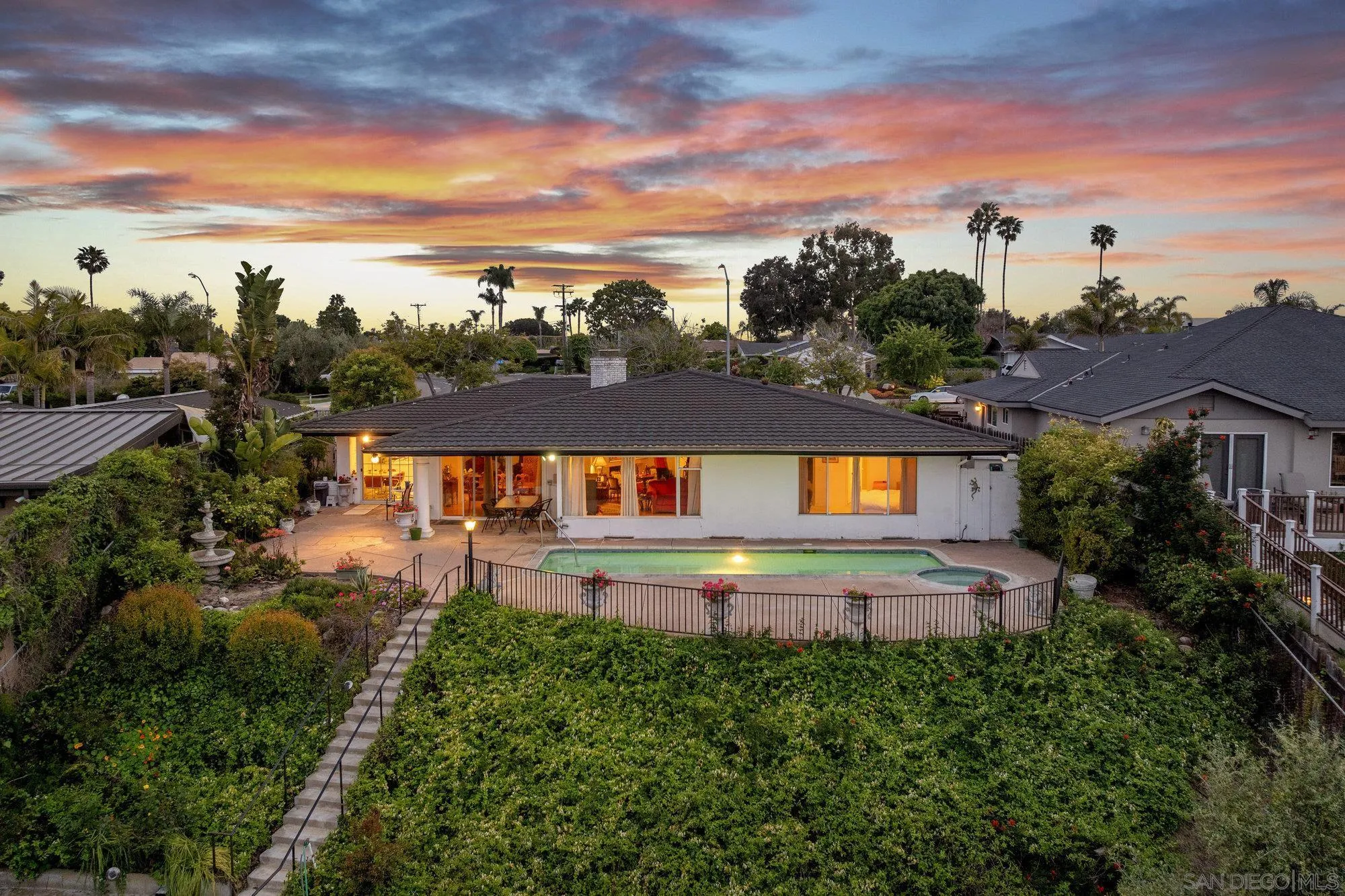 5903 Soledad Mountain Road La Jolla, CA 92037 - Photo 3 of 44 a front view of a house with a yard