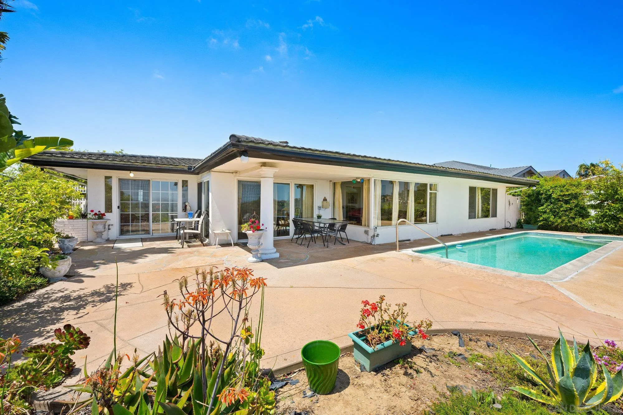 5903 Soledad Mountain Road La Jolla, CA 92037 - Photo 31 of 44 a view of house with yard outdoor seating and entertaining space